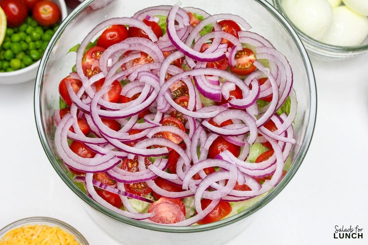 7 Layer Salad Recipe 11 - This Classic 7 Layer Salad is a tasty, healthy and fun make ahead salad for gatherings. It brings a burst of flavor and color to your table, making it a perfect choice for any relaxed get-together or potluck. Enjoy creating and sharing this delightful layered salad!