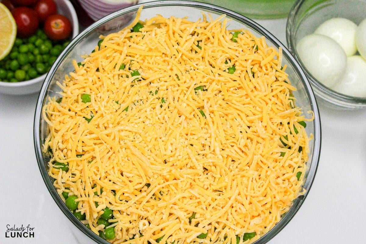 7 Layer Salad Recipe 22 - This Classic 7 Layer Salad is a tasty, healthy and fun make ahead salad for gatherings. It brings a burst of flavor and color to your table, making it a perfect choice for any relaxed get-together or potluck. Enjoy creating and sharing this delightful layered salad!