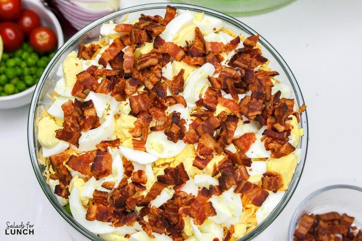 7 Layer Salad Recipe 32 - This Classic 7 Layer Salad is a tasty, healthy and fun make ahead salad for gatherings. It brings a burst of flavor and color to your table, making it a perfect choice for any relaxed get-together or potluck. Enjoy creating and sharing this delightful layered salad!