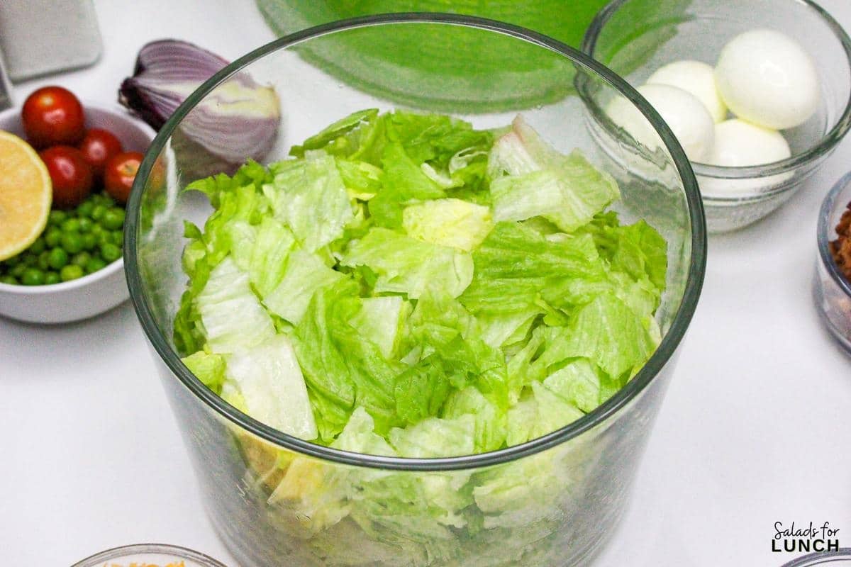 7 Layer Salad Recipe 4 - This Classic 7 Layer Salad is a tasty, healthy and fun make ahead salad for gatherings. It brings a burst of flavor and color to your table, making it a perfect choice for any relaxed get-together or potluck. Enjoy creating and sharing this delightful layered salad!