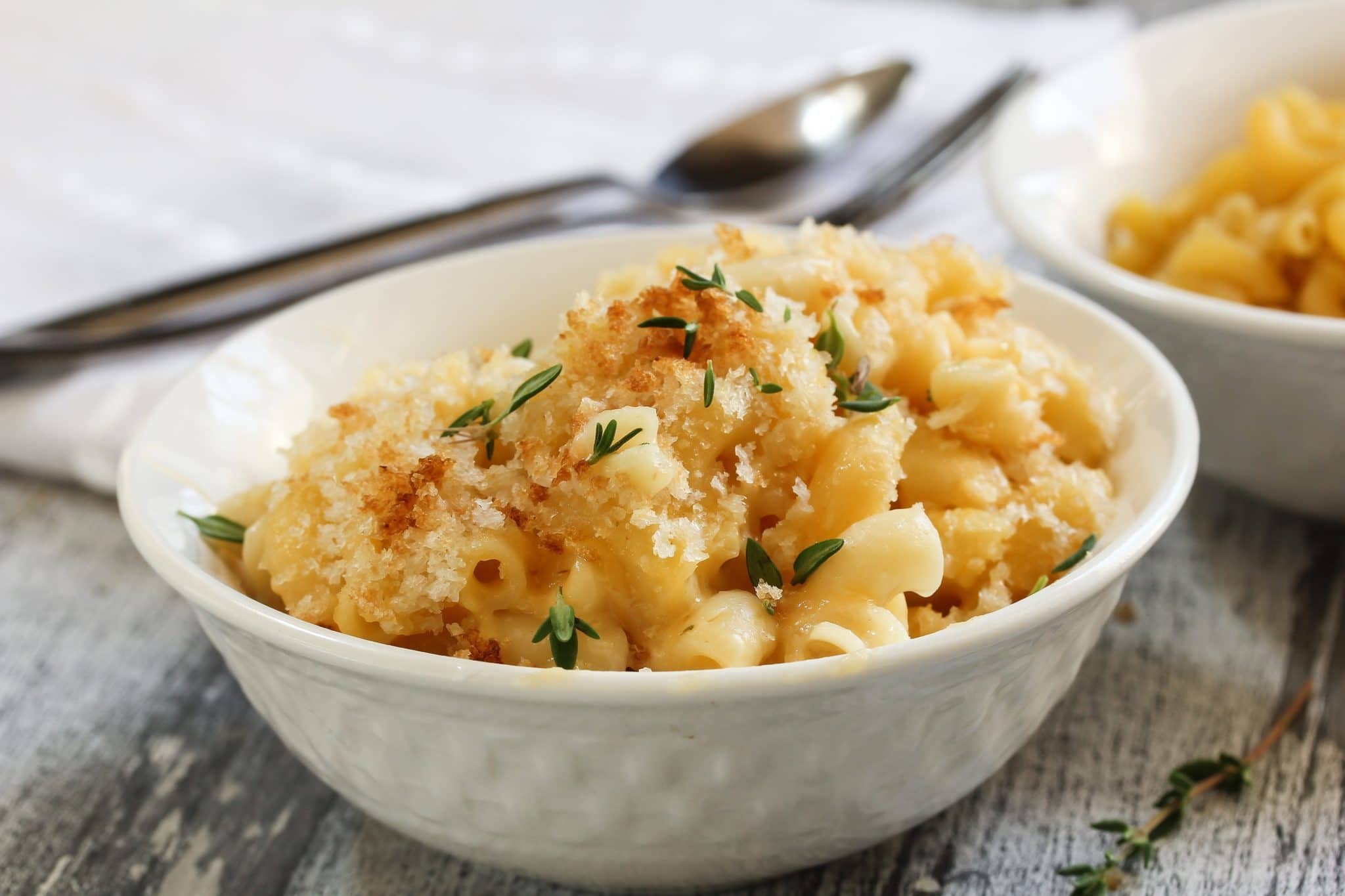 Homemade creamy baked mac and cheese doesn’t have to be complicated with layers of ingredients to be the soul-warming food you crave. This homemade baked macaroni and cheese is my most favorite and has pleased crowds, small families, kids and picky eaters alike–give it a try and you’ll see why. #comfortfood #kidfriendly #casserole #pastarecipe #macandcheese #dinnerinspiration