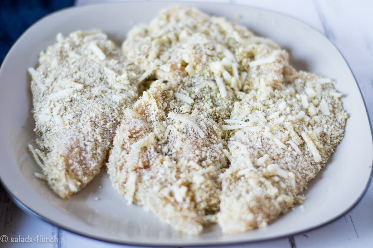 Air Fryer Chicken Parmesan 5 - Making this air fryer chicken parmesan is easy to do and takes half the time than it does in the conventional oven. Crispy and delicious! Garnish with parsley, serve with Easy Air Fryer Broccoli and enjoy!!