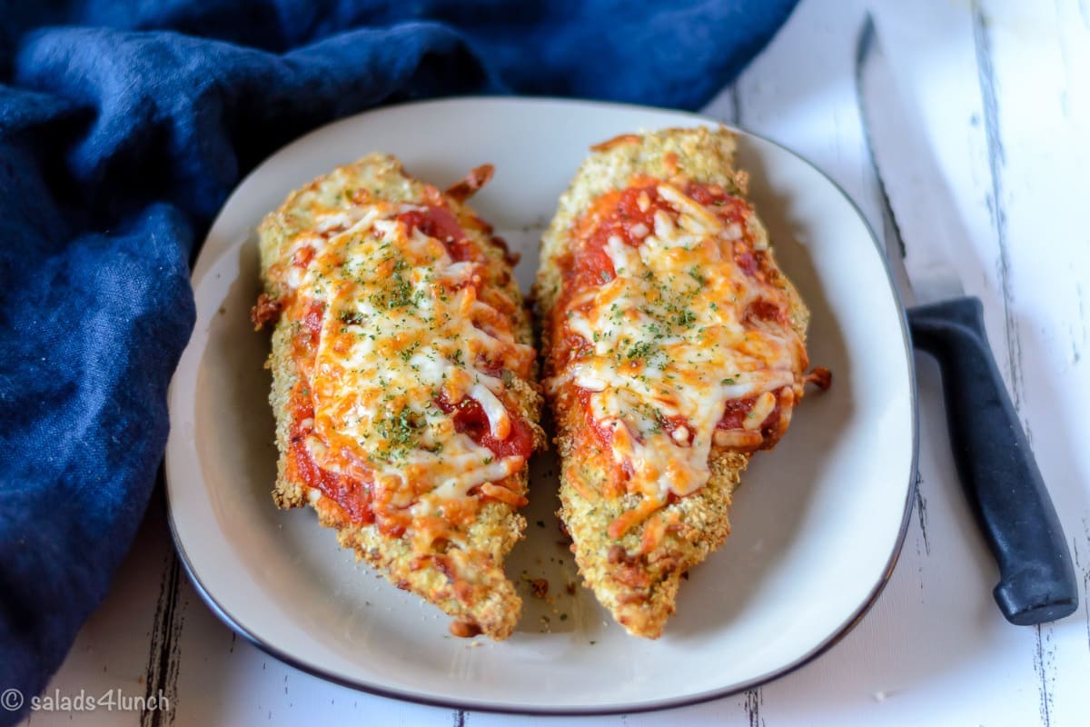 Easy Air Fryer Chicken Parmesan - Air Fryer Chicken Parmesan 9 Air Fryer Chicken Parmesan 9 - Making this air fryer chicken parmesan is easy to do and takes half the time than it does in the conventional oven. Crispy and delicious! Garnish with parsley, serve with Easy Air Fryer Broccoli and enjoy!!