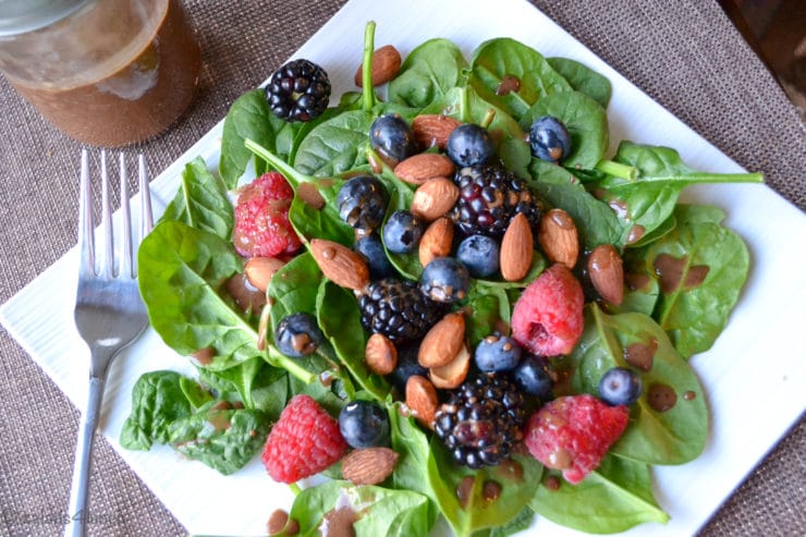 Berry and Spinach Salad with Balsamic Salad Dressing: A healthy and incredibly simple spinach salad topped with strawberries, blueberries, almonds, a squeeze of lemon, and a delightful balsamic vinegar dressing.
