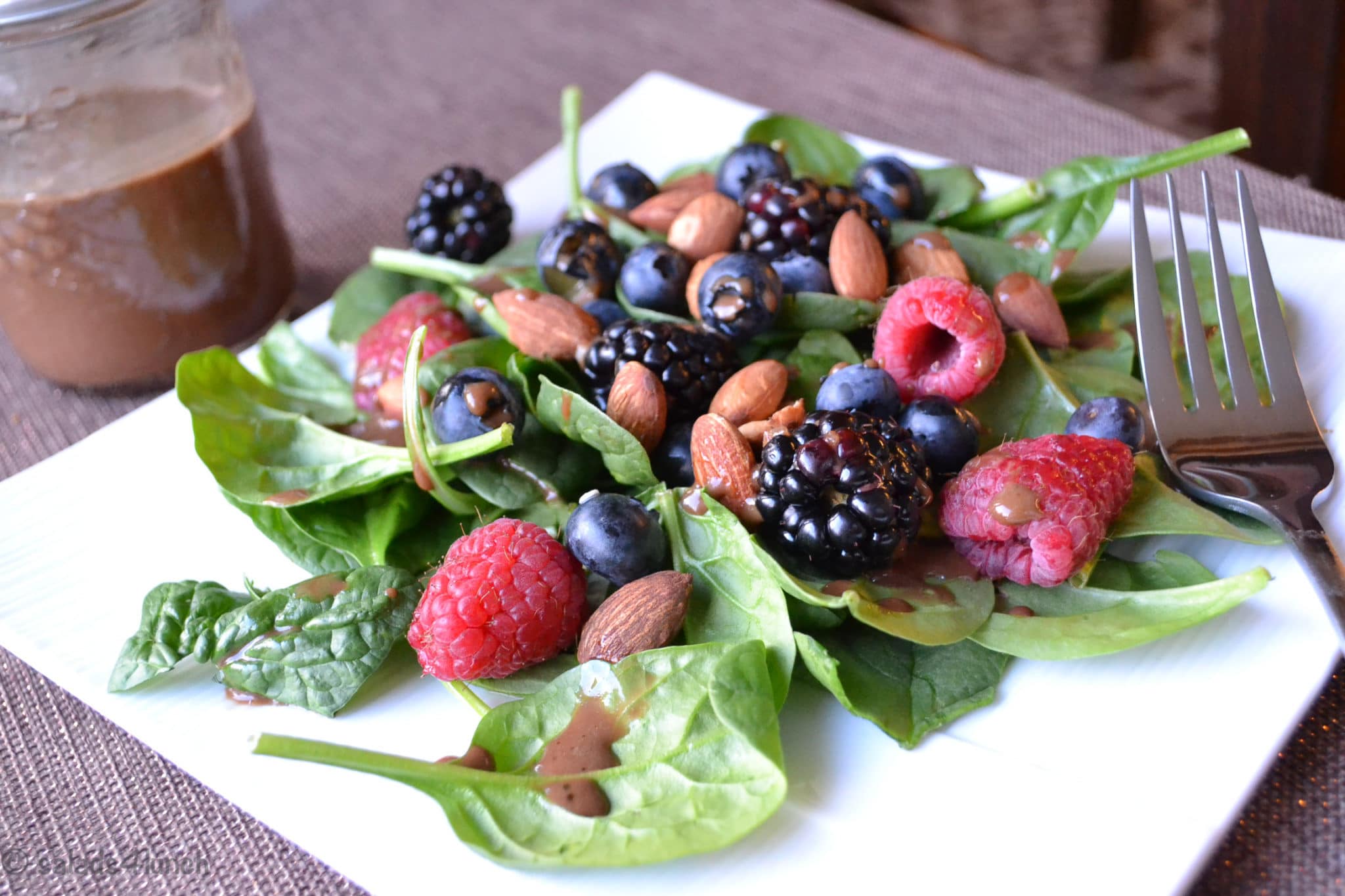 Berry and Spinach Salad with Balsamic Salad Dressing: A healthy and incredibly simple spinach salad topped with strawberries, blueberries, almonds, a squeeze of lemon, and a delightful balsamic vinegar dressing.