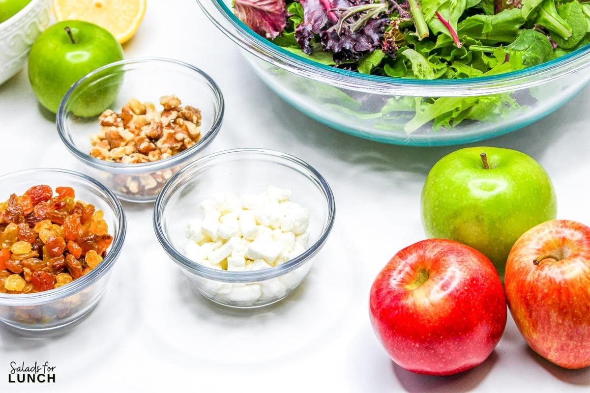 Apple and Goat Cheese Salad 2 - Crisp apples, tangy goat cheese, and crunchy pecans come together in this vibrant mixed green salad, drizzled with a zesty homemade vinaigrette. It’s the perfect balance of sweet, savory, and satisfying—like autumn in every bite! 🍏🥗✨