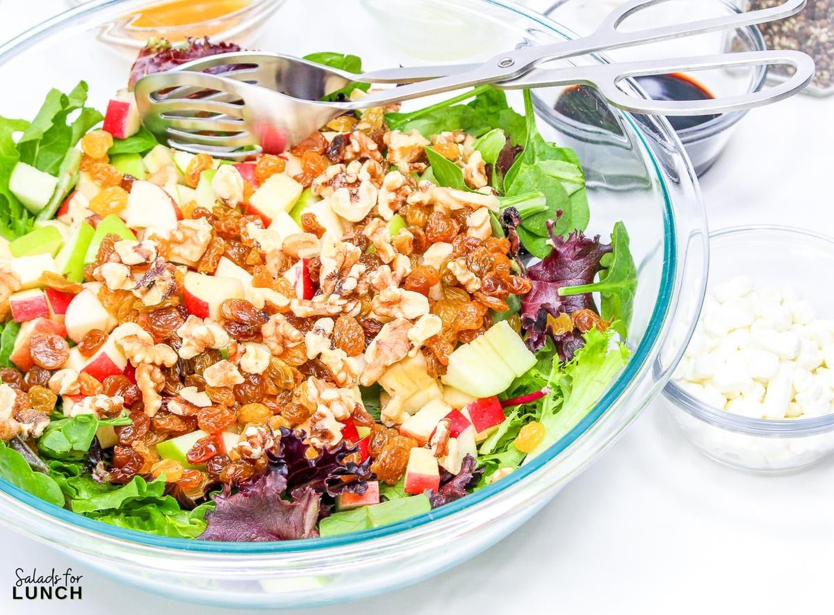 Apple and Goat Cheese Salad 4 - Crisp apples, tangy goat cheese, and crunchy pecans come together in this vibrant mixed green salad, drizzled with a zesty homemade vinaigrette. It’s the perfect balance of sweet, savory, and satisfying—like autumn in every bite! 🍏🥗✨