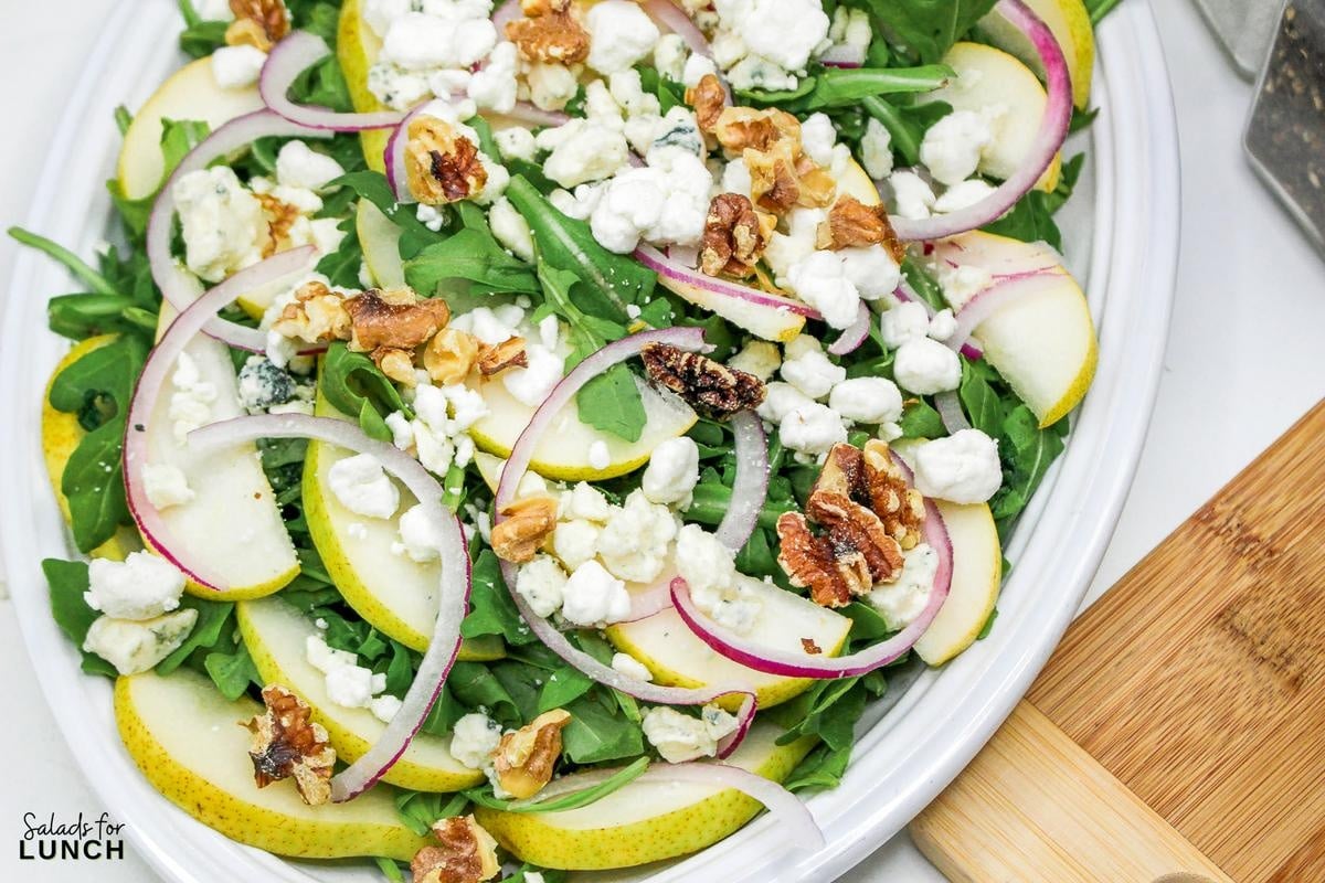 Arugula Salad with Pears and Goat Cheese Recipe 10 - Fall is here, and it’s time to bring those seasonal flavors to your table with an easy and delicious Arugula Salad with Pears and Goat Cheese!