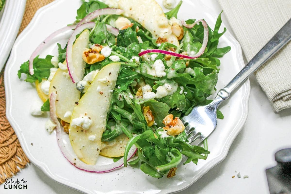 Arugula Salad with Pears and Goat Cheese Recipe 39 - Fall is here, and it’s time to bring those seasonal flavors to your table with an easy and delicious Arugula Salad with Pears and Goat Cheese!