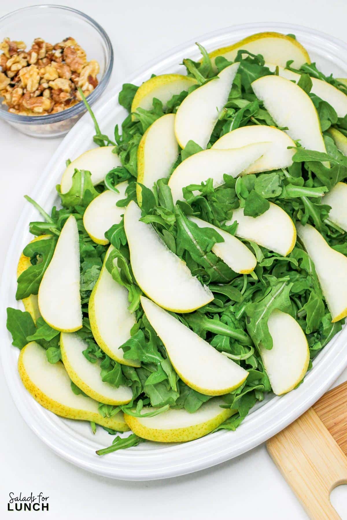 Arugula Salad with Pears and Goat Cheese Recipe 9 - Fall is here, and it’s time to bring those seasonal flavors to your table with an easy and delicious Arugula Salad with Pears and Goat Cheese!