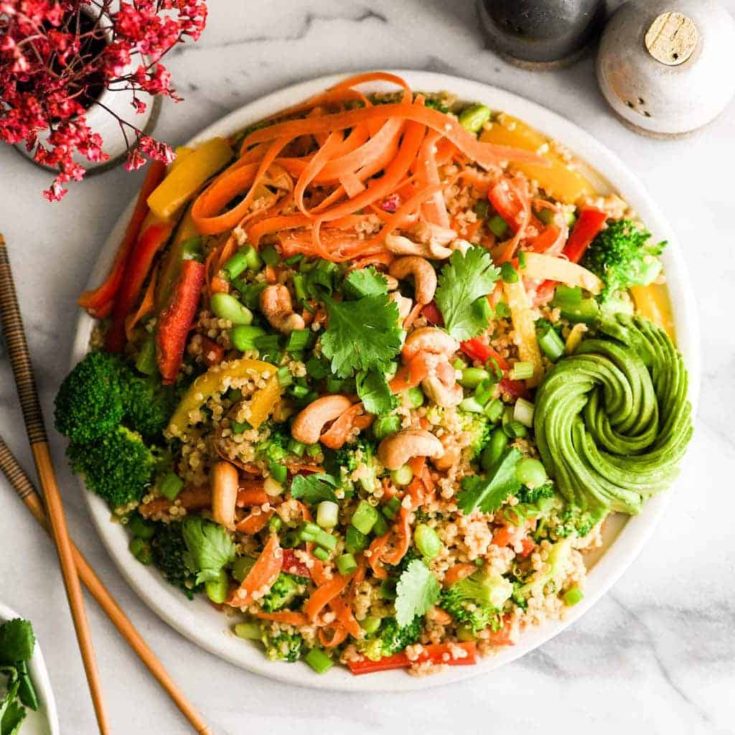 Asian Quinoa Salad with Peanut Dressing recipe gluten free dairy free vegan square 1 - Let’s go keen-wah crazy with this tasty round-up of easy quinoa salad recipes to take to your next potluck! These delicious quinoa salad recipes are gloriously gluten-free with lots of vegetarian options too.