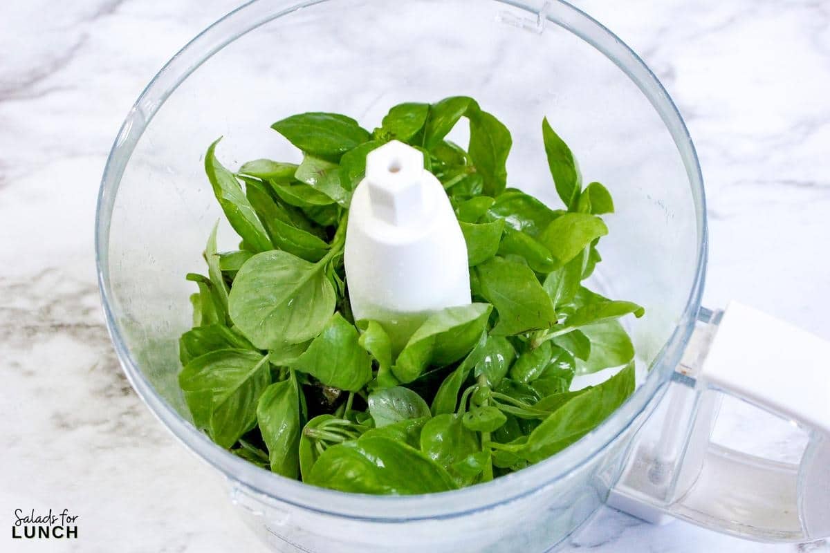Basil Pesto Recipe 2 - Learn how to whip up a delicious homemade basil pesto that's both quick and healthy. This versatile sauce can elevate any dish, making it a must-have in your kitchen repertoire. Try making this simple basil pesto today and add a burst of fresh flavor to your meals!