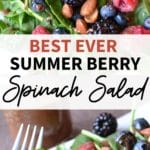 Close up of spinach salad with raspn=berries, blackberries, blueberries and almonds