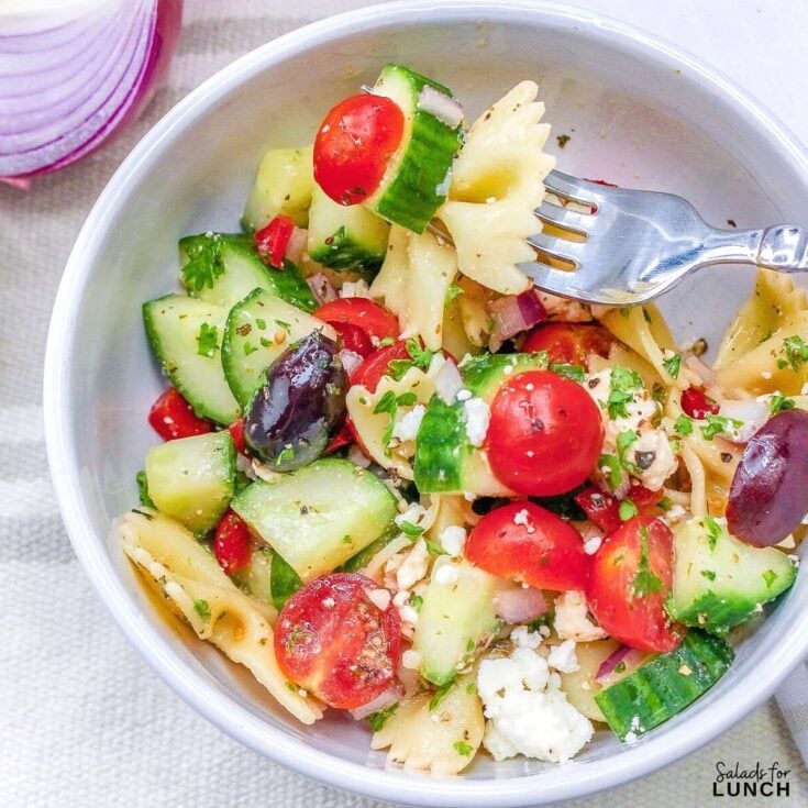 BOW TIE GREEK PASTA SALAD 1 - Shake up your weekday lunch with these tasty, healthy salads for lunch recipes that are great on the go. Make a filling and healthy salad that will power you through any work day. Full of protein and fiber these quick salads are an easy way to spruce up your lunch.