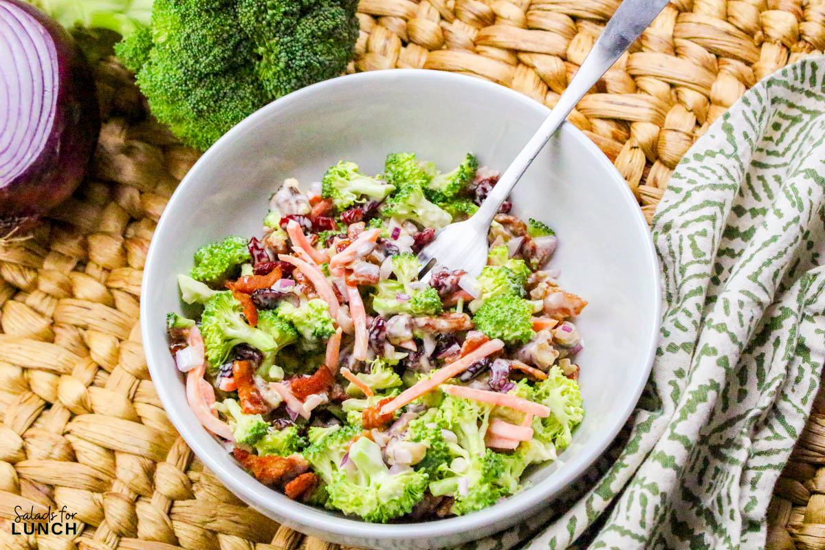 Broccoli Crunch Salad Recipe 19 - If you're looking for a salad that's as fun to eat as it is to make, this Broccoli Crunch Salad is the one! It's packed with texture, flavor, and a little bit of everything—crunchy broccoli, sweet raisins, crispy bacon, and a tangy, creamy dressing that ties it all together. This salad is a great way to add some color to your table, and it's always a hit at potlucks and family gatherings.