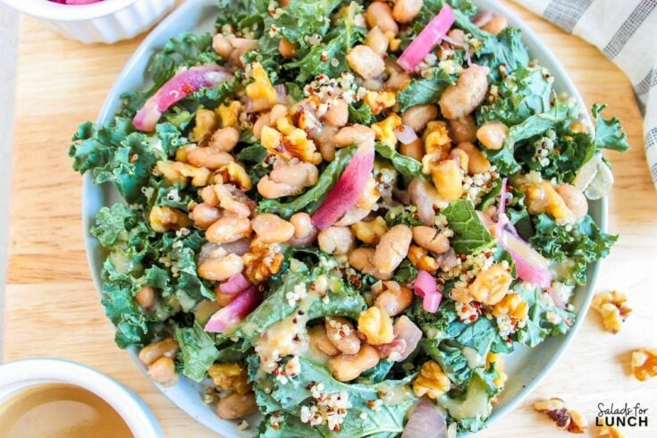 Butterbean and Walnut Kale Salad with Maple Tahini Dressing Recipe 9 - Shake up your weekday lunch with these tasty, healthy salads for lunch recipes that are great on the go. Make a filling and healthy salad that will power you through any work day. Full of protein and fiber these quick salads are an easy way to spruce up your lunch.