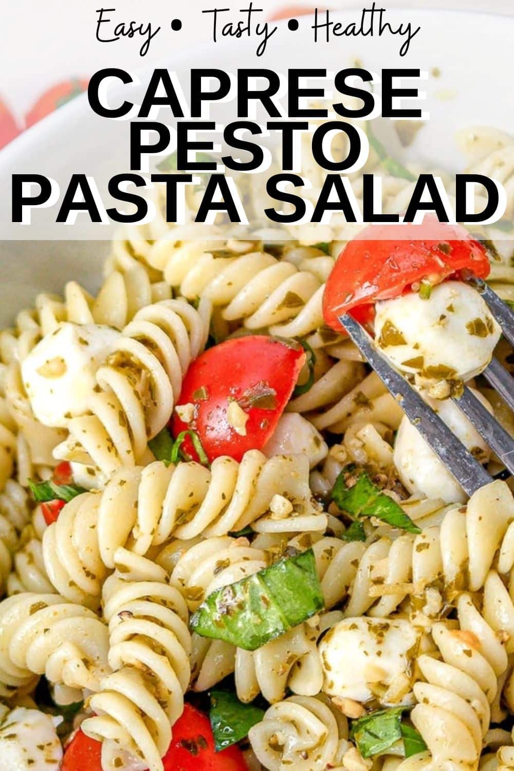 Caprese Pesto Pasta Salad - This pasta salad is loaded with your favorite pasta noodles, fresh tomatoes and mozzarella and tossed in the best tasty pesto! It's such an easy dish and perfect for anytime of the year!