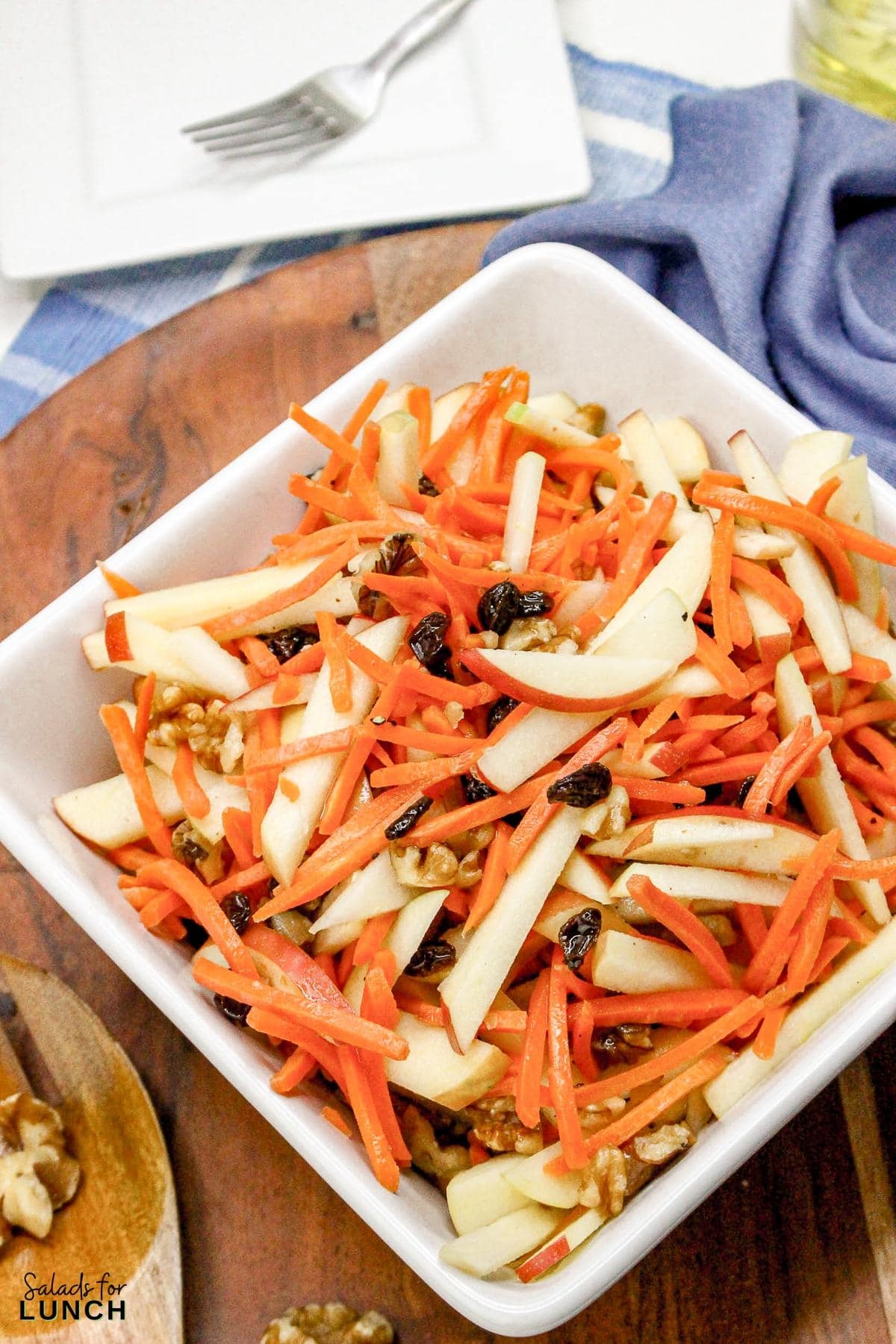 Carrot Raisin Salad with Apples - Carrot Raisin Salad with Apples Recipe 15 Carrot Raisin Salad with Apples Recipe 15 - This fresh and simple carrot raisin salad combines crisp apples and crunchy carrots with a light, tangy dressing. It's a perfect vegetarian side dish for a light lunch or dinner, bringing together sweetness and a bit of zest.