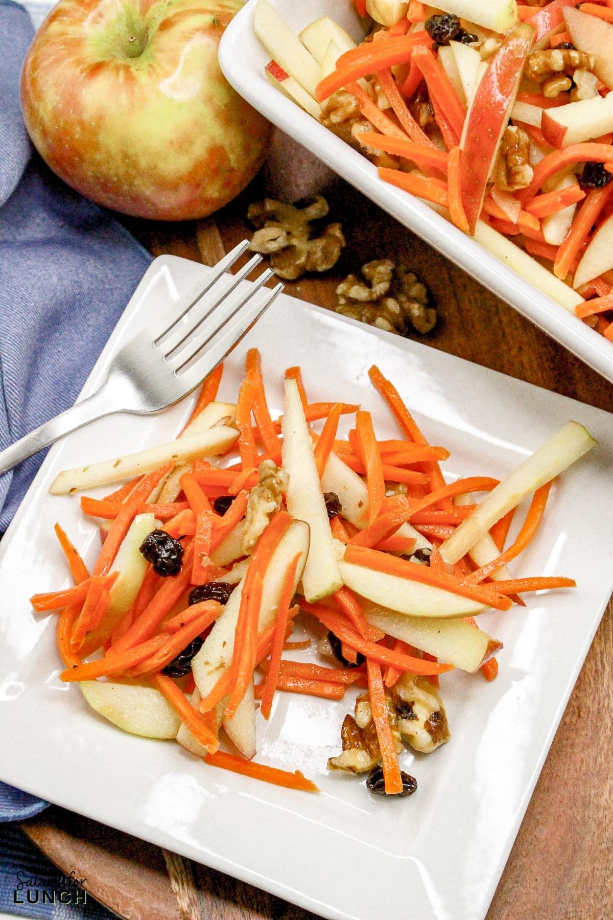 Carrot Raisin Salad with Apples Recipe 25 - This fresh and simple carrot raisin salad combines crisp apples and crunchy carrots with a light, tangy dressing. It's a perfect vegetarian side dish for a light lunch or dinner, bringing together sweetness and a bit of zest.