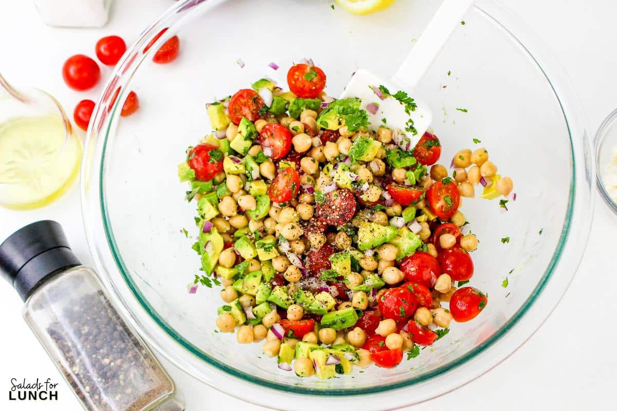Chickpea Avocado Salad Recipe 11 - This Chickpea Avocado Salad with Light Lemon Dressing salad is not only super easy to whip up but also bursting with fresh flavors and wholesome ingredients. Whether you're looking for a quick lunch, a light dinner, or a tasty side dish, this Chickpea Avocado Salad is sure to hit the spot.