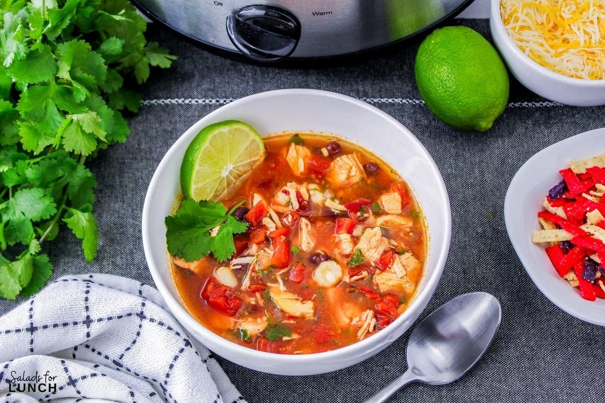 Chilis Southwest Chicken Soup Recipe 13 - Indulge in a taste fiesta with this Chili's Copycat Southwest Chicken Soup! Hearty, flavorful, and easy to make, this soul-warming delight features tender chicken, black beans, and hominy in a smoky chipotle broth. Spice it up and savor the Southwest in every comforting spoonful.