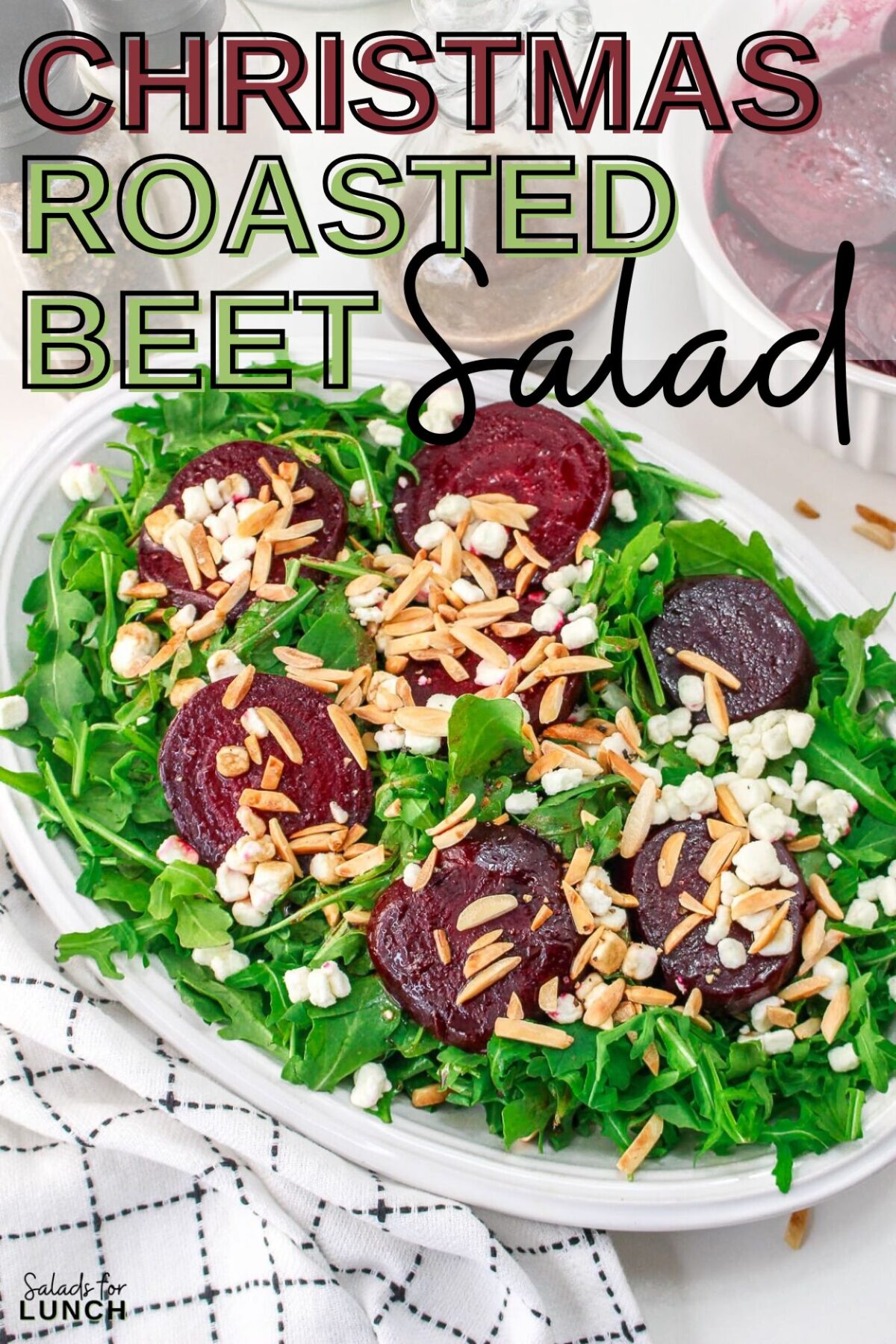 Christmas Salad Roasted Beet Salad - With the festive hues of red beets, green arugula, and golden slivered almonds, this Christmas salad recipe is a celebration of flavors and a feast for the eyes that will make your holiday spread merry and bright!