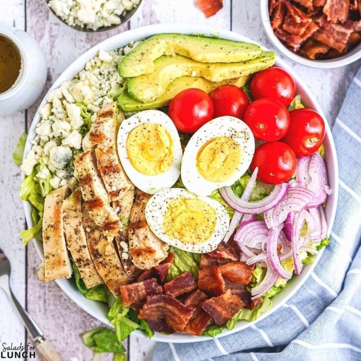Classic Cob Salad Square Featured Photo - Shake up your weekday lunch with these tasty, healthy salads for lunch recipes that are great on the go. Make a filling and healthy salad that will power you through any work day. Full of protein and fiber these quick salads are an easy way to spruce up your lunch.