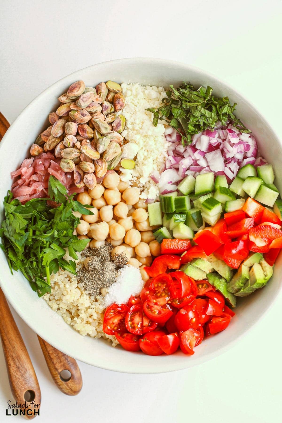 Copycat Quinoa Salad 1 - Looking for an easy, fast and healthy lunch option? Try this delicious TikTok quinoa salad! Not only is this salad loaded with flavor, but it also provides a good source of protein and fiber from the chickpeas, quinoa, and pistachios. You're going to love this easy to make quinoa salad recipe!