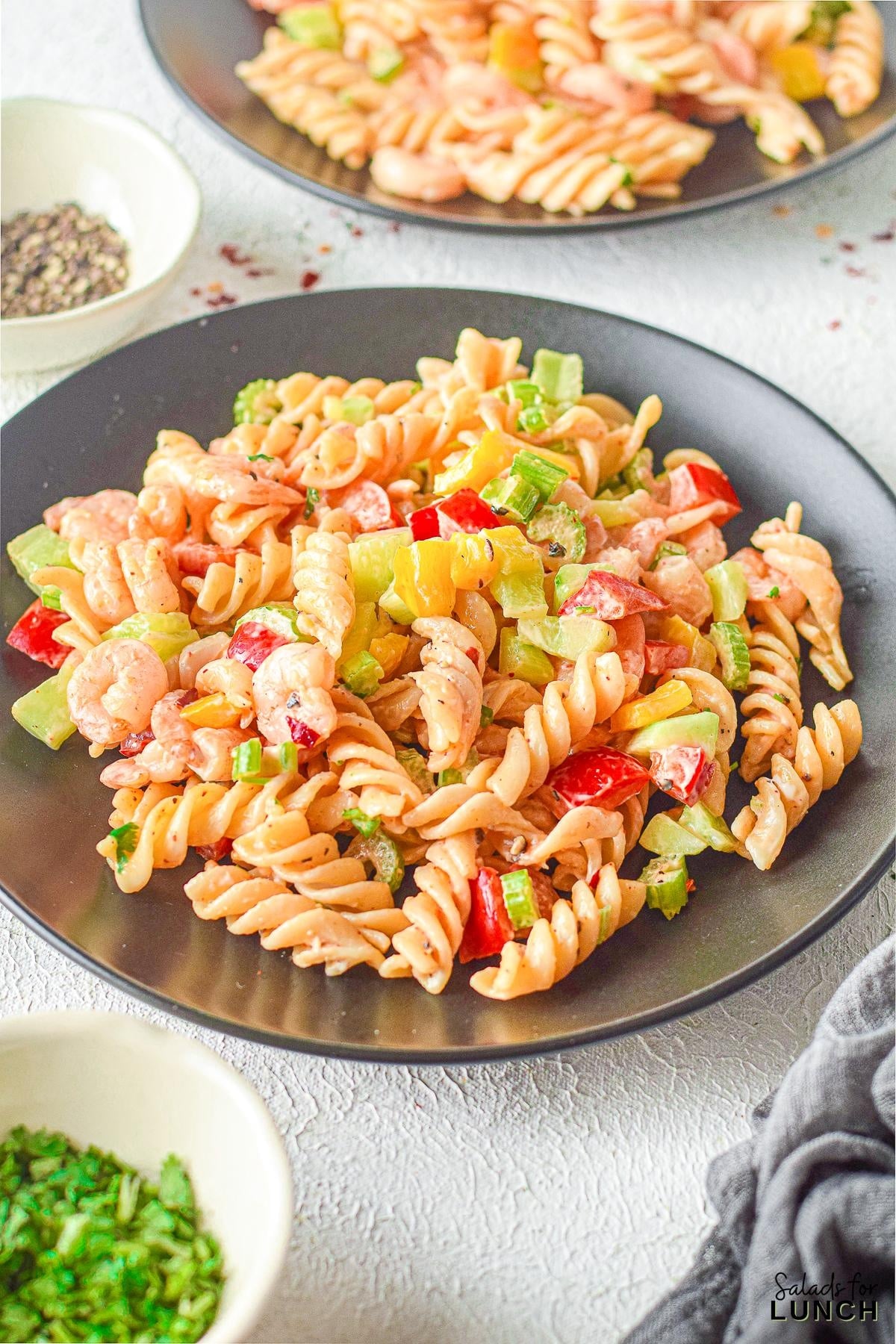 Creamy Shrimp Pasta Salad 11 - Indulge in the ultimate summer delight with our Creamy Shrimp Pasta Salad Recipe and let the flavors transport you to a sunny beachside retreat. Whether you're seeking a satisfying meal or a crowd-pleasing dish, this recipe is sure to become a staple in your culinary repertoire. So, grab your apron and get ready to embark on a culinary journey that will leave your taste buds dancing with joy!