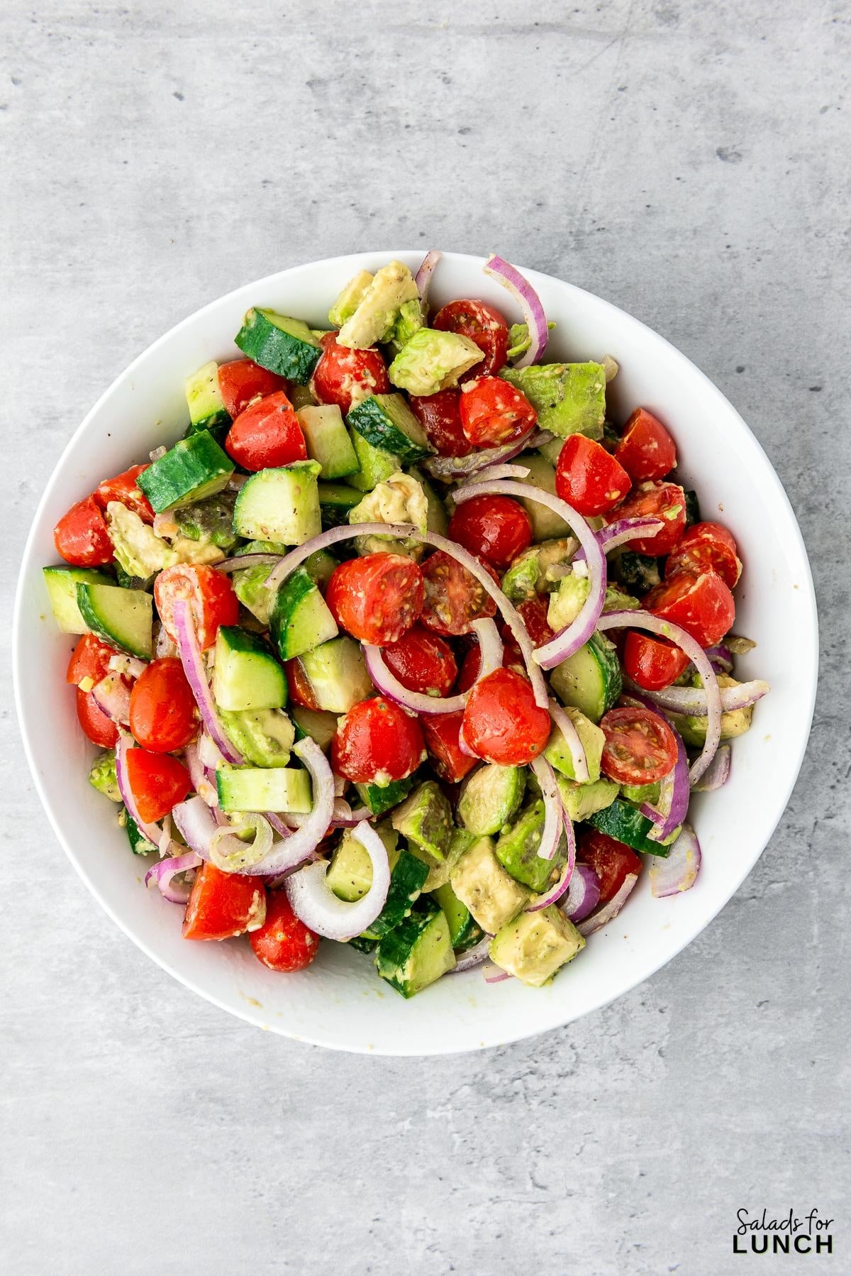 Cucumber Tomato Avocado Salad Recipe 10 - This Cucumber and Tomato Avocado Salad is a healthy side dish that’s packed with flavor, nutrients, and a refreshing crunch. Whether you’re short on time or just want to add a light and colorful dish to your table, this recipe is your go-to. Give it a try and enjoy a little slice of freshness in every bite!