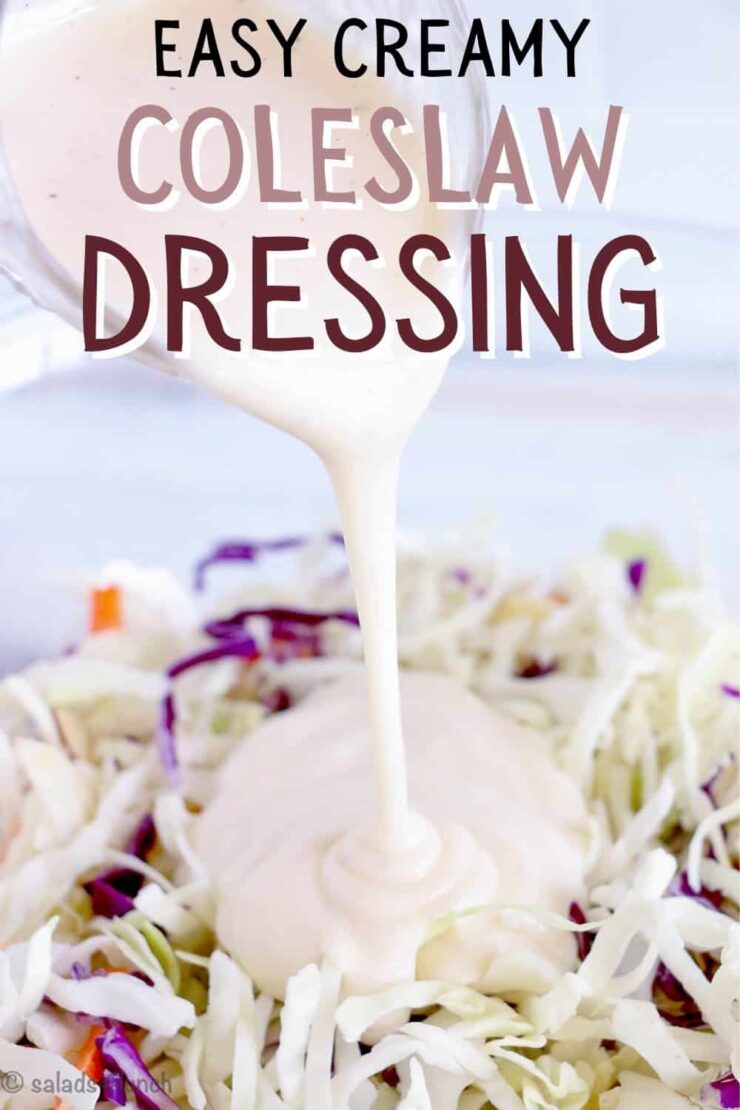 Creamy Coleslaw dressing being poured  over coleslaw in a white bowl with grapes and sunflower seeds with text overlay that says: "Easy Creamy Coleslaw Dressing".