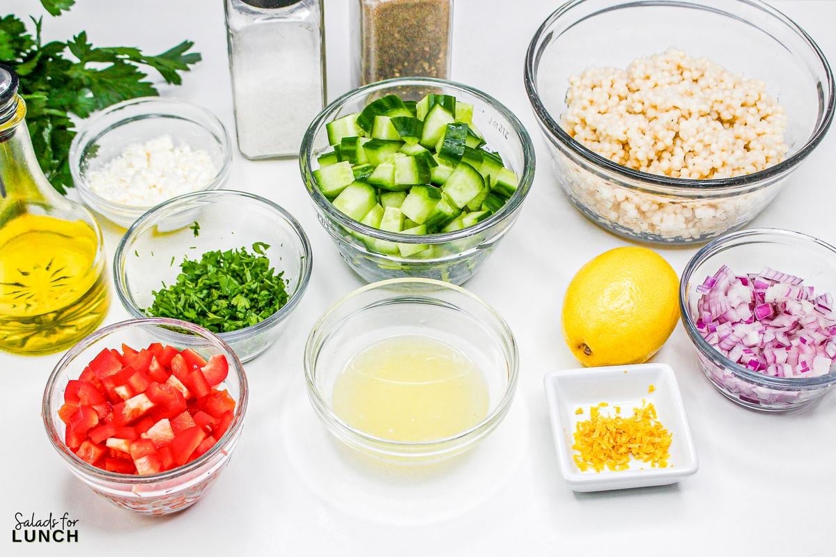 Easy Lemon Couscous Salad Recipe 2 - Zesty Lemon Couscous Salad - a refreshing and vibrant summer salad recipe bursting with citrusy flavors, feta cheese and crisp veggies!