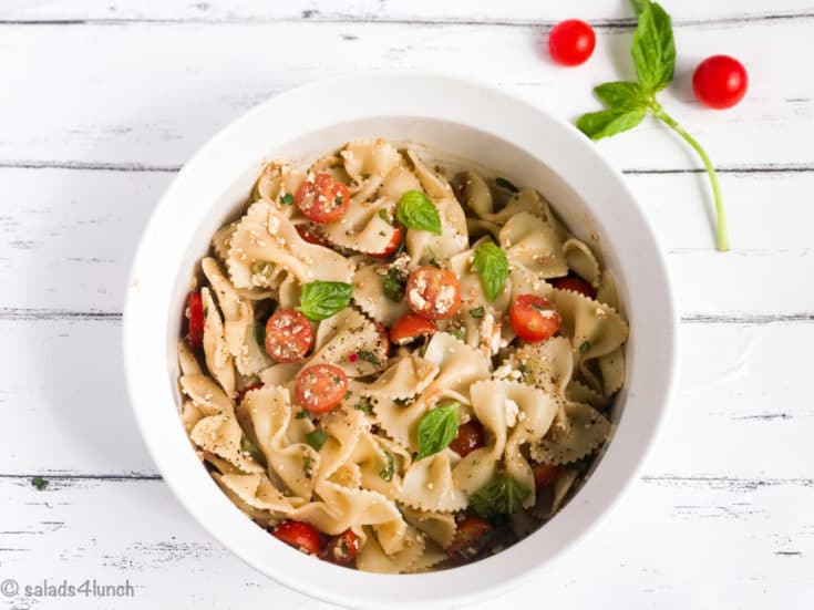 Feta Bruschetta Pasta Salad 2 - Shake up your weekday lunch with these tasty, healthy salads for lunch recipes that are great on the go. Make a filling and healthy salad that will power you through any work day. Full of protein and fiber these quick salads are an easy way to spruce up your lunch.