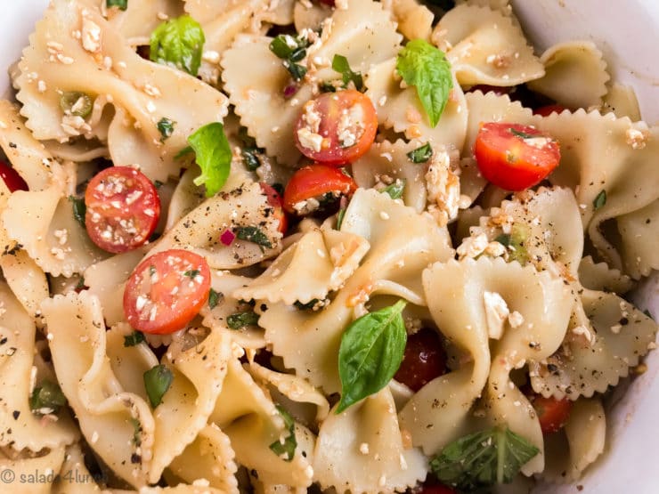 This quick and easy Feta Bruschetta Pasta Salad packs bold flavours to stand up to your summer grilling feasts and is sure to be a hit at your next BBQ or cookout.