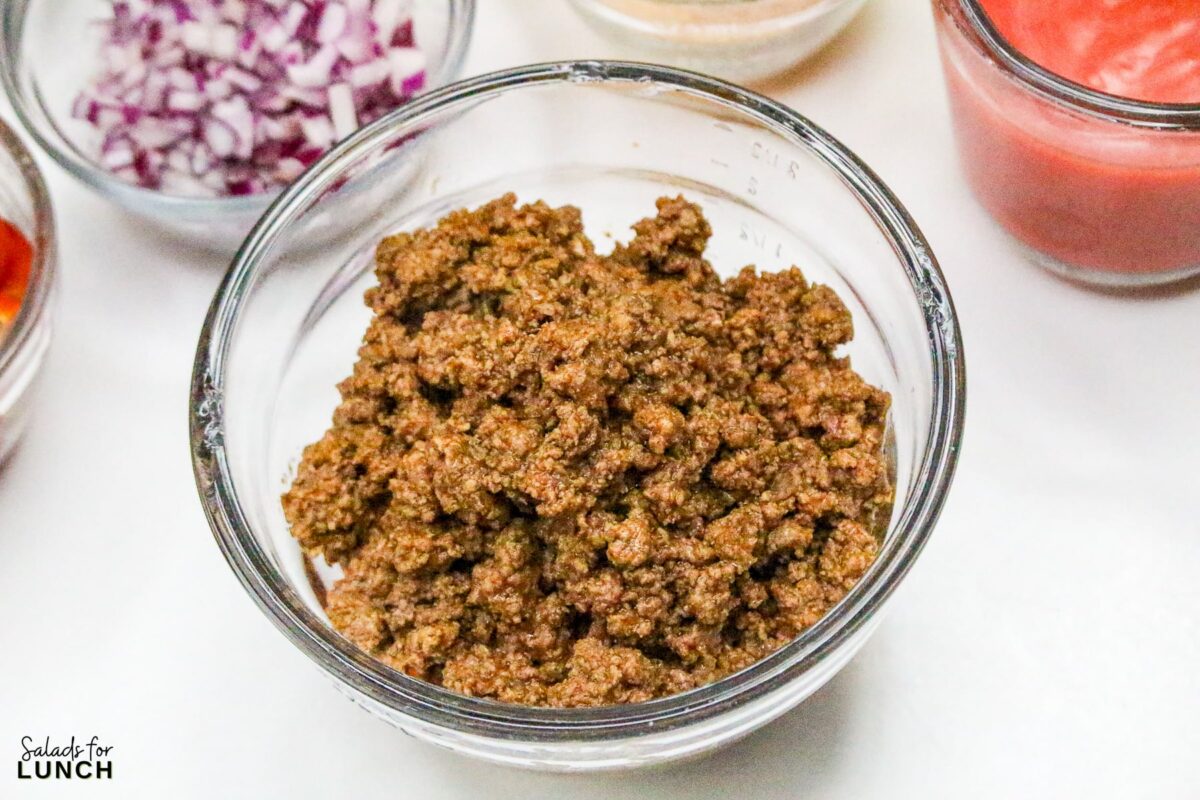 Frito Taco Salad Recipe 5 - Frito Taco Salad is a fun, flavorful, and easy dish that always gets rave reviews. Whether you're bringing it to a backyard BBQ, potluck, or just making it for a weeknight meal, it’s a guaranteed favorite. The combination of fresh ingredients, bold taco seasoning, and crispy Fritos makes every bite delicious. Give this recipe a try and watch it disappear in no time!