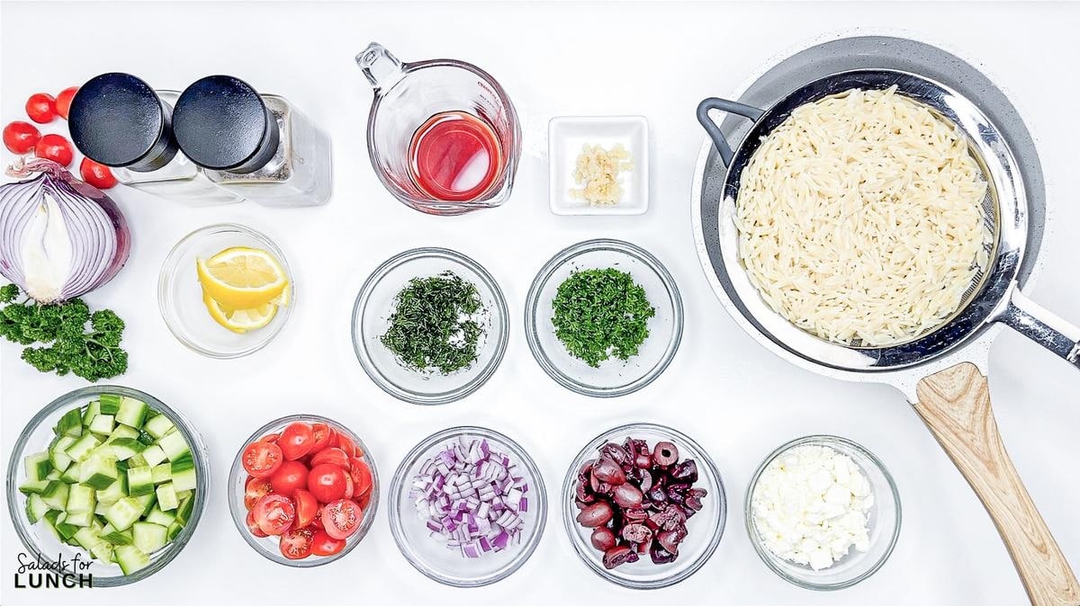 Greek Orzo Salad 33 - Are you ready to jazz up your lunchtime routine with a salad that's as delicious as it is easy to make? Say hello to the Greek Orzo Salad—a vibrant, refreshing dish that's bursting with Mediterranean flavors and perfect for any meal. Whether you're looking for a quick lunch or a light dinner, this salad is a crowd-pleaser that’s sure to satisfy. This Greek Orzo Salad comes together in just 25 minutes, making it an ideal choice for busy days when you still want to eat something healthy and delicious.