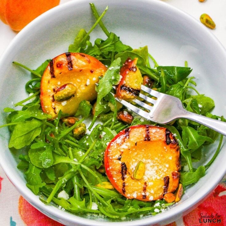 Grilled Peach Summer Salad 1 - Shake up your weekday lunch with these tasty, healthy salads for lunch recipes that are great on the go. Make a filling and healthy salad that will power you through any work day. Full of protein and fiber these quick salads are an easy way to spruce up your lunch.