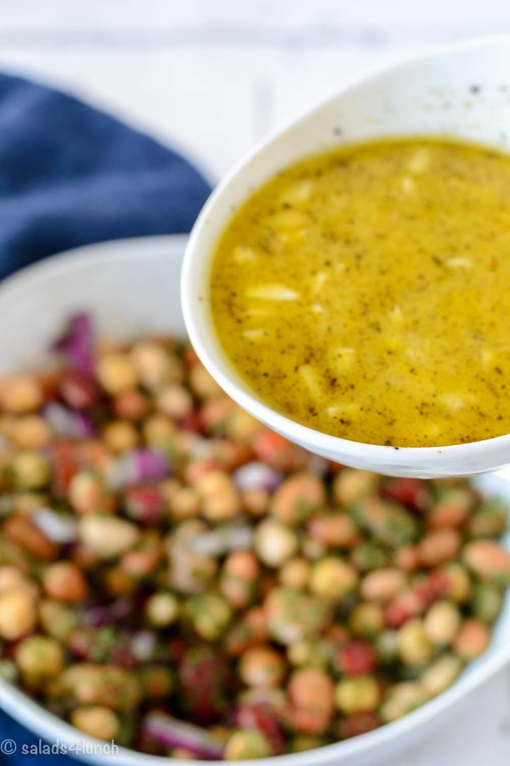 Heart Healthy Bean Salad 5 - Heart Healthy Mixed Bean Salad: Turn canned beans, lentils and chickpeas into a flavourful salad that will add a healthy boost to your meals. Perfect year round, this fibre-rich salad is a great way of incorporating legumes into your diet.   This can be served as a side dish, perfect for potlucks or to make it a main for lunch serve it over spiralized cucumbers.