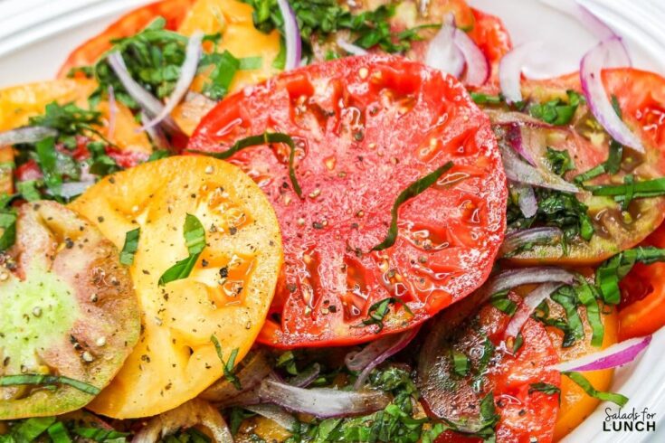 Heirloom Tomato Basil Salad Recipe 29 - These fall salads will help you make the most of October’s fresh, seasonal produce while adding flavor, nutrition, and variety to your meals. Enjoy the richness of fall in every bite!