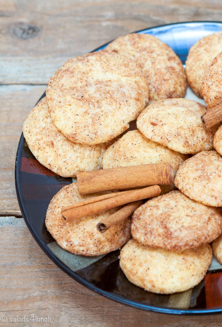Plate of Snickerdoodle cookies with cinnamon sugar topping.