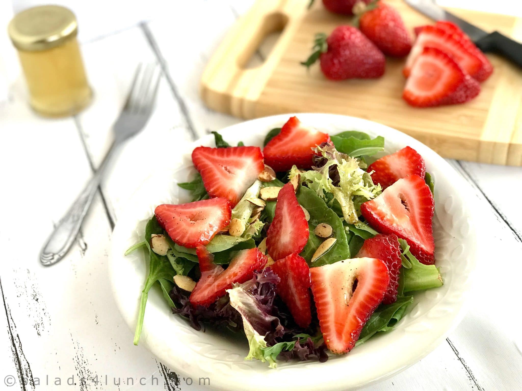 Honey Vinaigrette Salad Dressing. An easy formula for this salad dressing that you can customize to your taste buds. Tangy, sweet, and delicious! #summersalad #saladdressing #strawberrysalad #honeyvinagrette #healthysalad