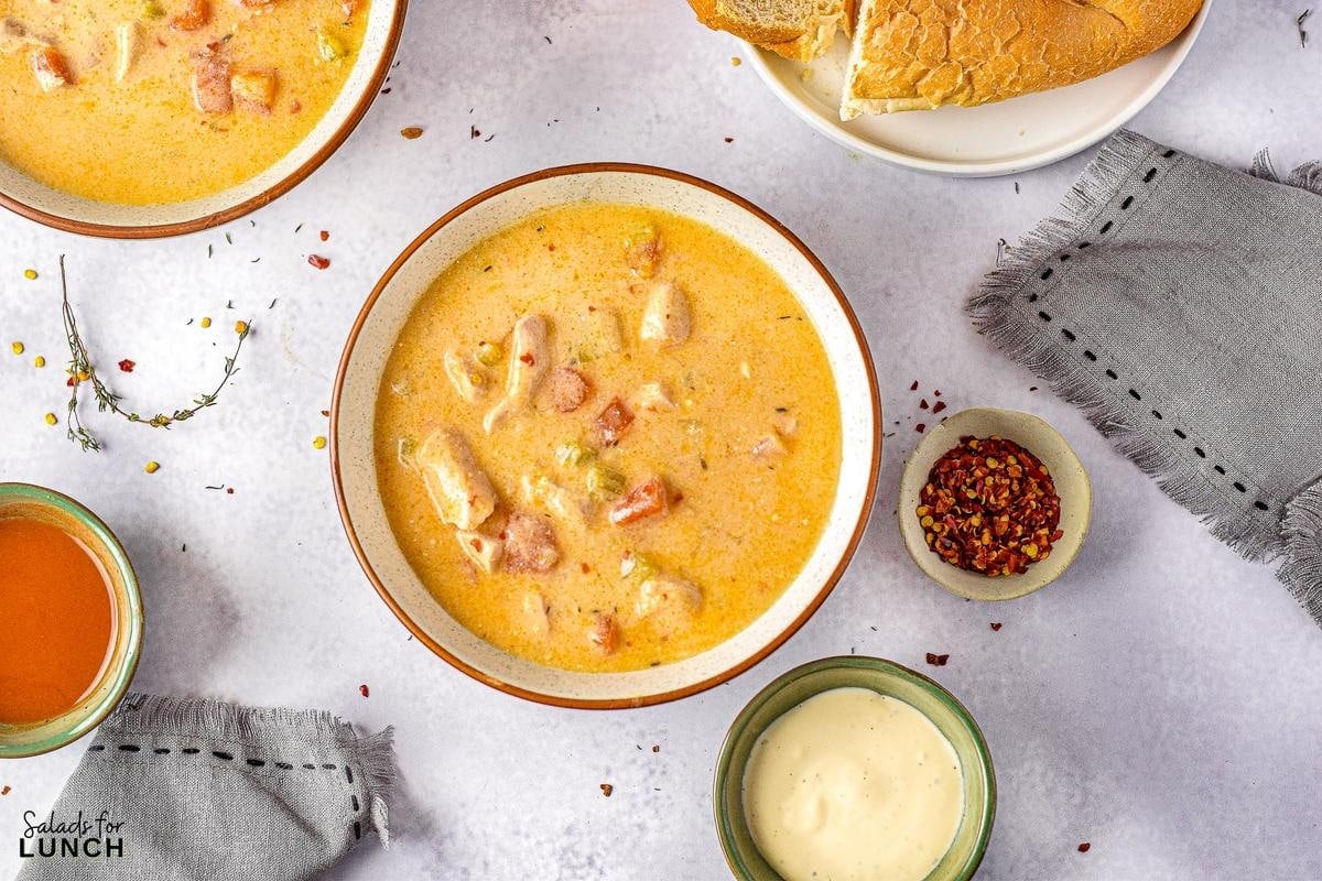 Instant Pot Buffalo Chicken Soup 14 - Get ready to warm up your taste buds with this Instant Pot Creamy Buffalo Chicken Soup recipe! Packed with tender chunks of chicken, a creamy base with a kick of hot buffalo sauce, and a medley of veggies, it's the perfect comfort food for any season. With just a few simple ingredients, your Instant Pot will do all the work, making this hearty soup a quick and delicious dinner idea.