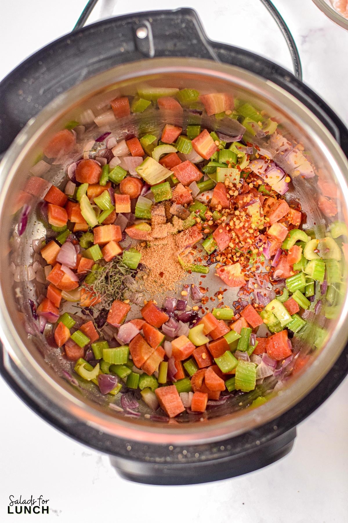 Instant Pot Buffalo Chicken Soup 4 - Get ready to warm up your taste buds with this Instant Pot Creamy Buffalo Chicken Soup recipe! Packed with tender chunks of chicken, a creamy base with a kick of hot buffalo sauce, and a medley of veggies, it's the perfect comfort food for any season. With just a few simple ingredients, your Instant Pot will do all the work, making this hearty soup a quick and delicious dinner idea.