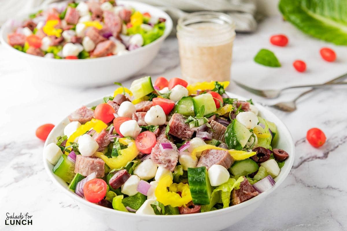 Italian Chopped Salad Recipe 30 - This hearty Italian Chopped Salad with Zesty Dressing that is the perfect mix of healthy and satisfying. Whether you’re craving a healthy dinner option or a dish that’s quick to prepare, this salad has you covered. Get ready to enjoy a meal that’s as nutritious as it is delicious!