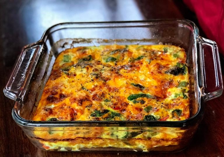 Meal Prep Keto Sausage, Egg, and Spinach Breakfast Casserole is the perfect quick and easy make-ahead, meal prep dish with cheese, sauteed onions, and peppers. This dish is keto friendly and perfect for keto diets. Serve this dish for your holiday breakfasts and brunch! #KetoBreakfast #KetoFriendly #BreakfastCasserole #MealPrep #MealPrepBreakfast #MealPrepCasserole #HealthyBreakfast