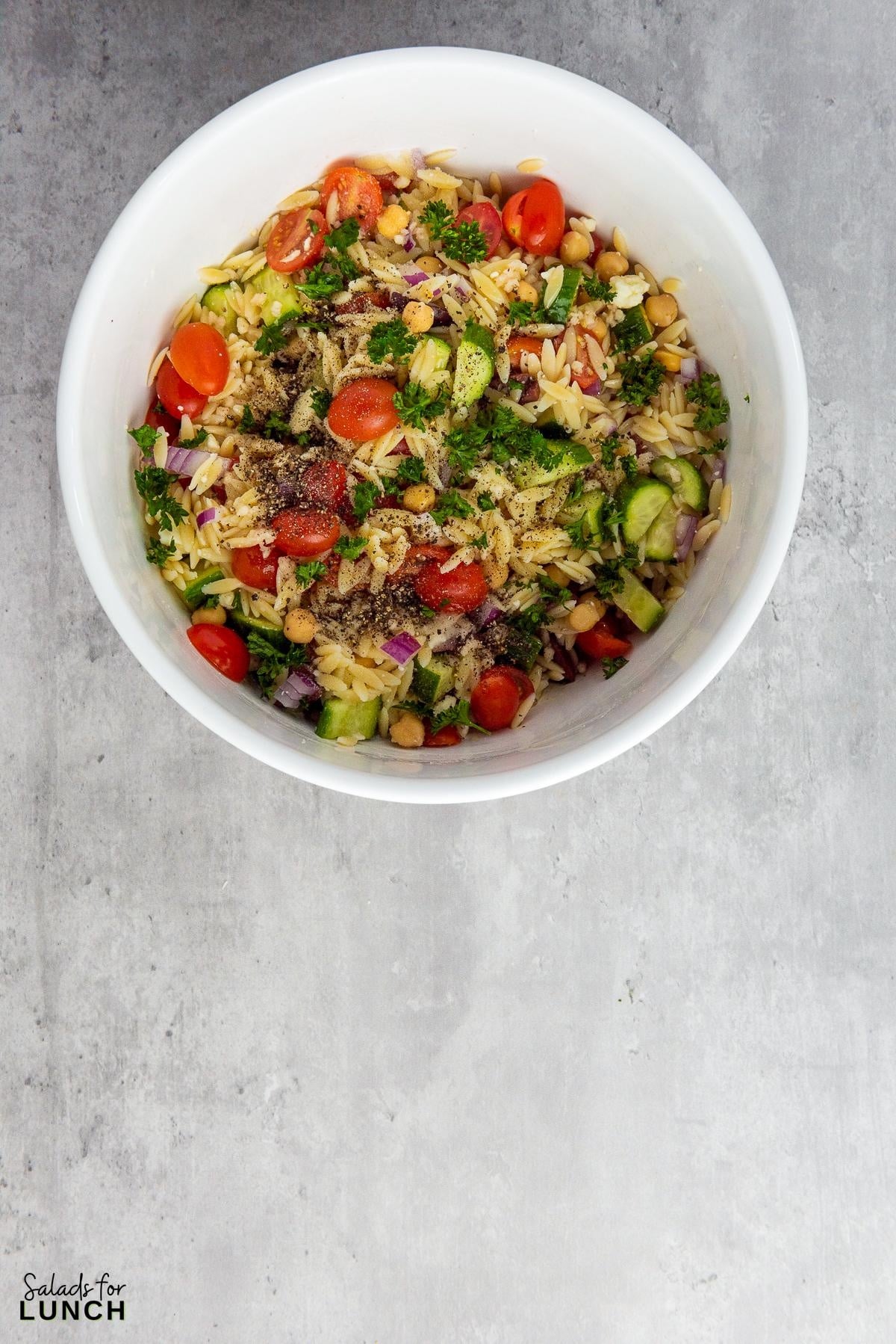 Mediterranean Orzo Salad Recipe 18 - You're going to love this Mediterranean Orzo Salad, a delightful blend of orzo pasta, cherry tomatoes, Persian cucumbers, and kalamata olives
