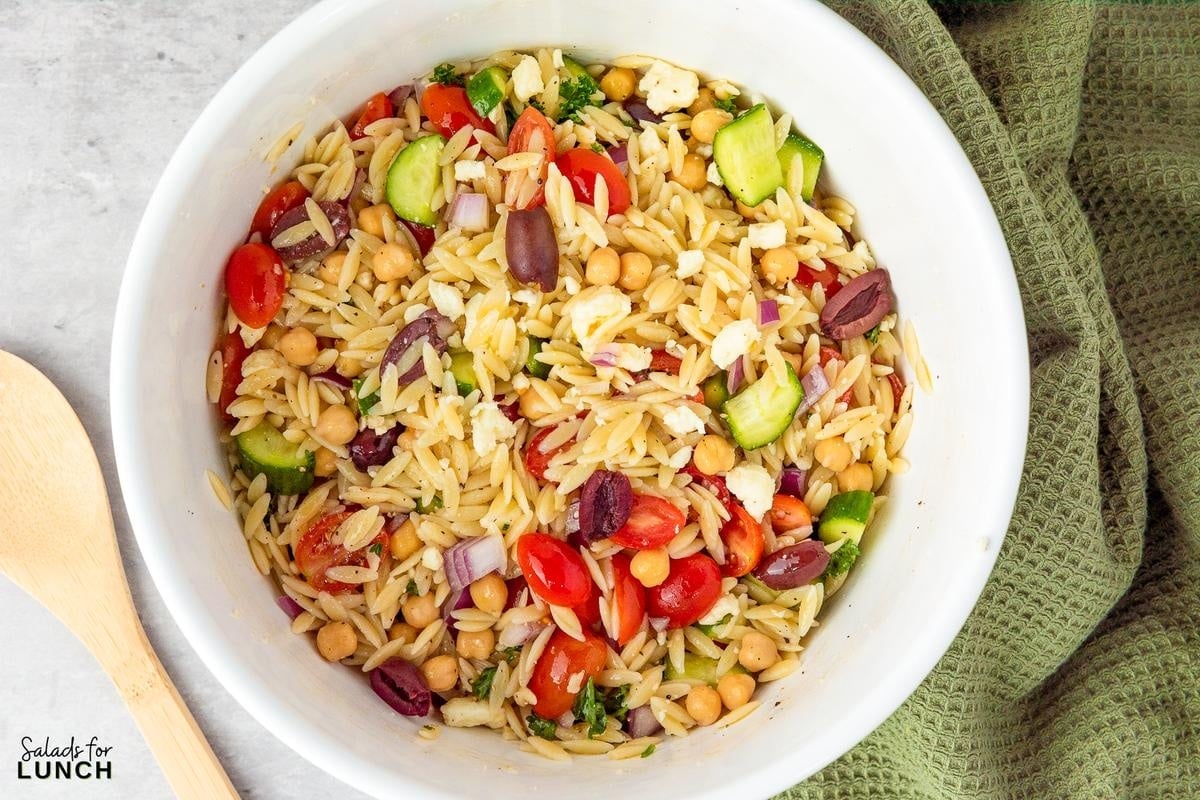 Mediterranean Orzo Salad Recipe 19 - You're going to love this Mediterranean Orzo Salad, a delightful blend of orzo pasta, cherry tomatoes, Persian cucumbers, and kalamata olives