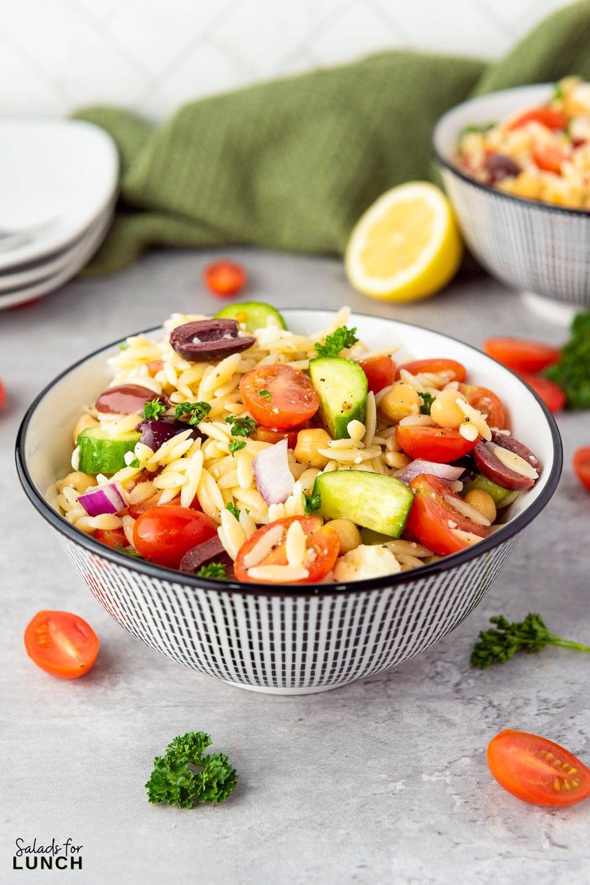 Mediterranean Orzo Salad Recipe 22 - You're going to love this Mediterranean Orzo Salad, a delightful blend of orzo pasta, cherry tomatoes, Persian cucumbers, and kalamata olives