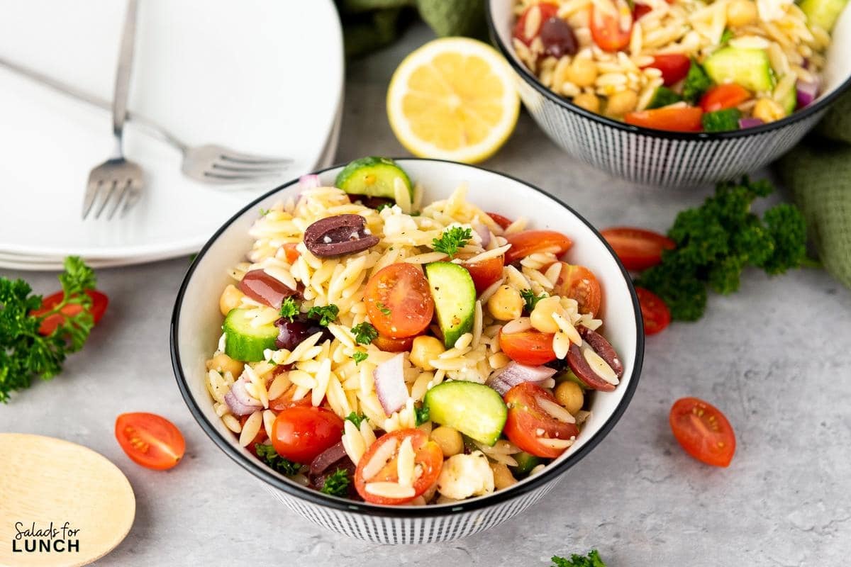 Mediterranean Orzo Salad Recipe 28 - You're going to love this Mediterranean Orzo Salad, a delightful blend of orzo pasta, cherry tomatoes, Persian cucumbers, and kalamata olives