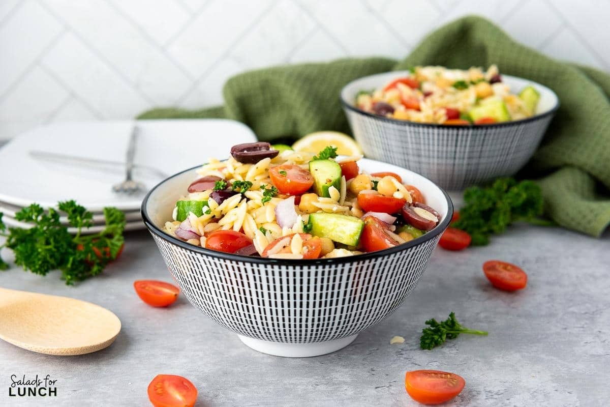 Mediterranean Orzo Salad Recipe 34 - You're going to love this Mediterranean Orzo Salad, a delightful blend of orzo pasta, cherry tomatoes, Persian cucumbers, and kalamata olives
